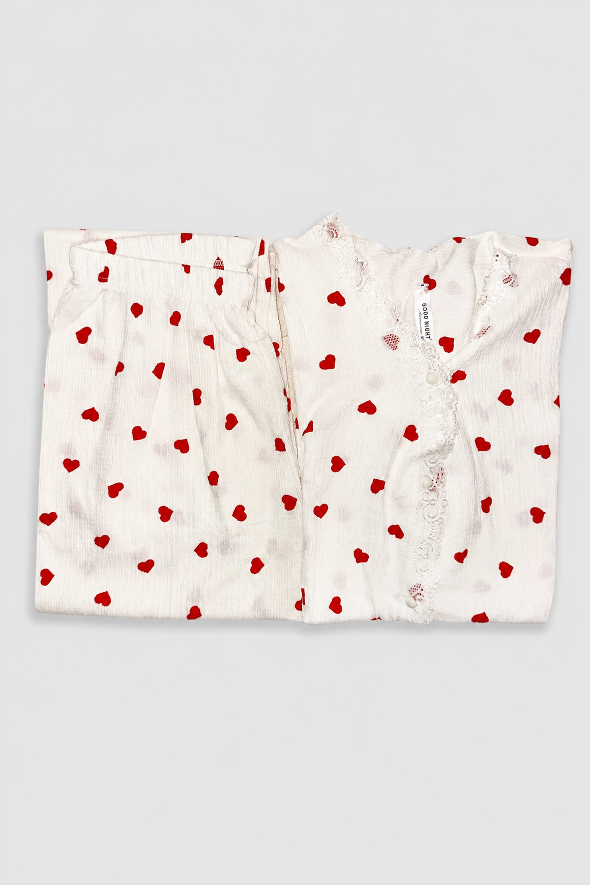 Chemise de nuit blanche à cœurs rouges