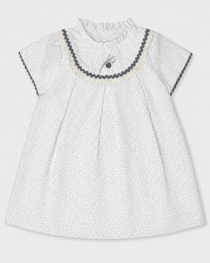Seconde main - Robe bébé blanche à pois gris et col en dentelle