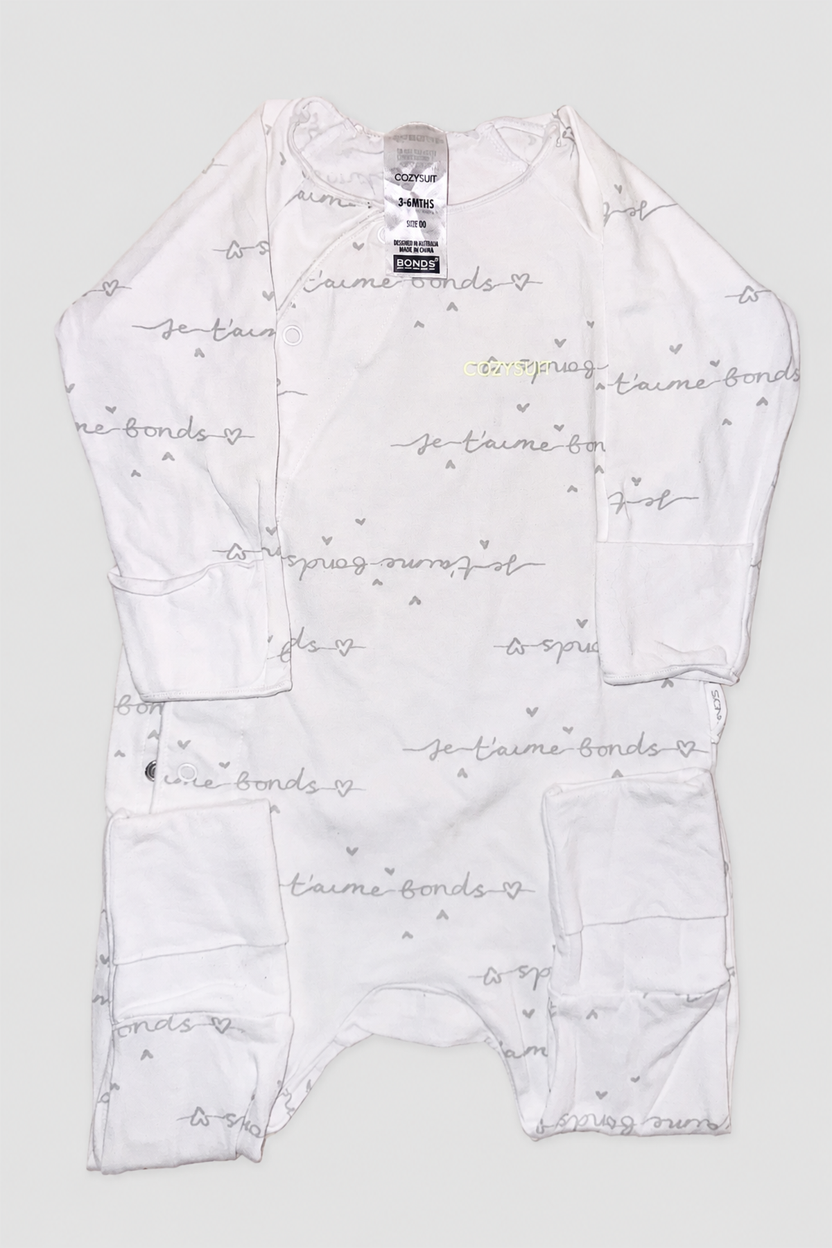Seconde main – Grenouillère blanche à petits cœurs