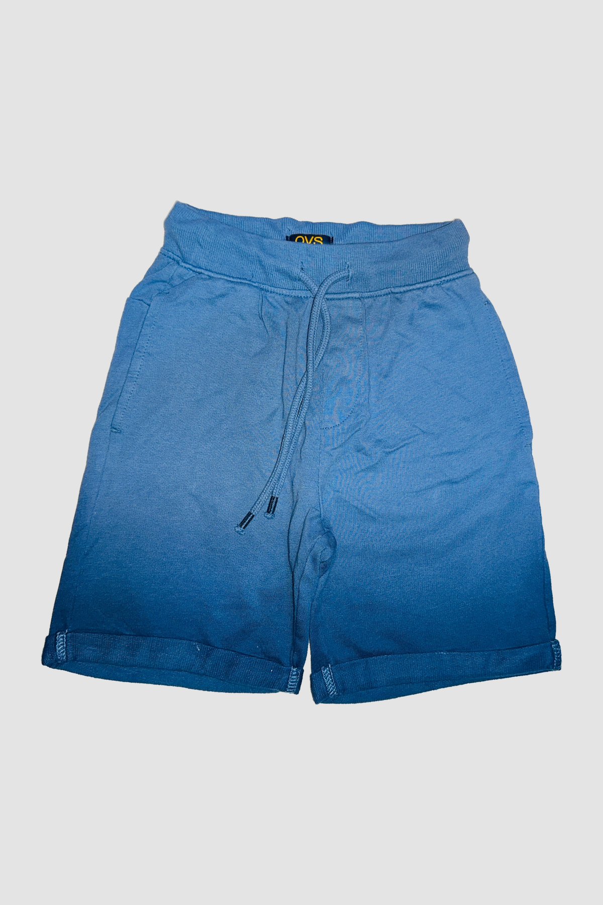 short garcon bleu face