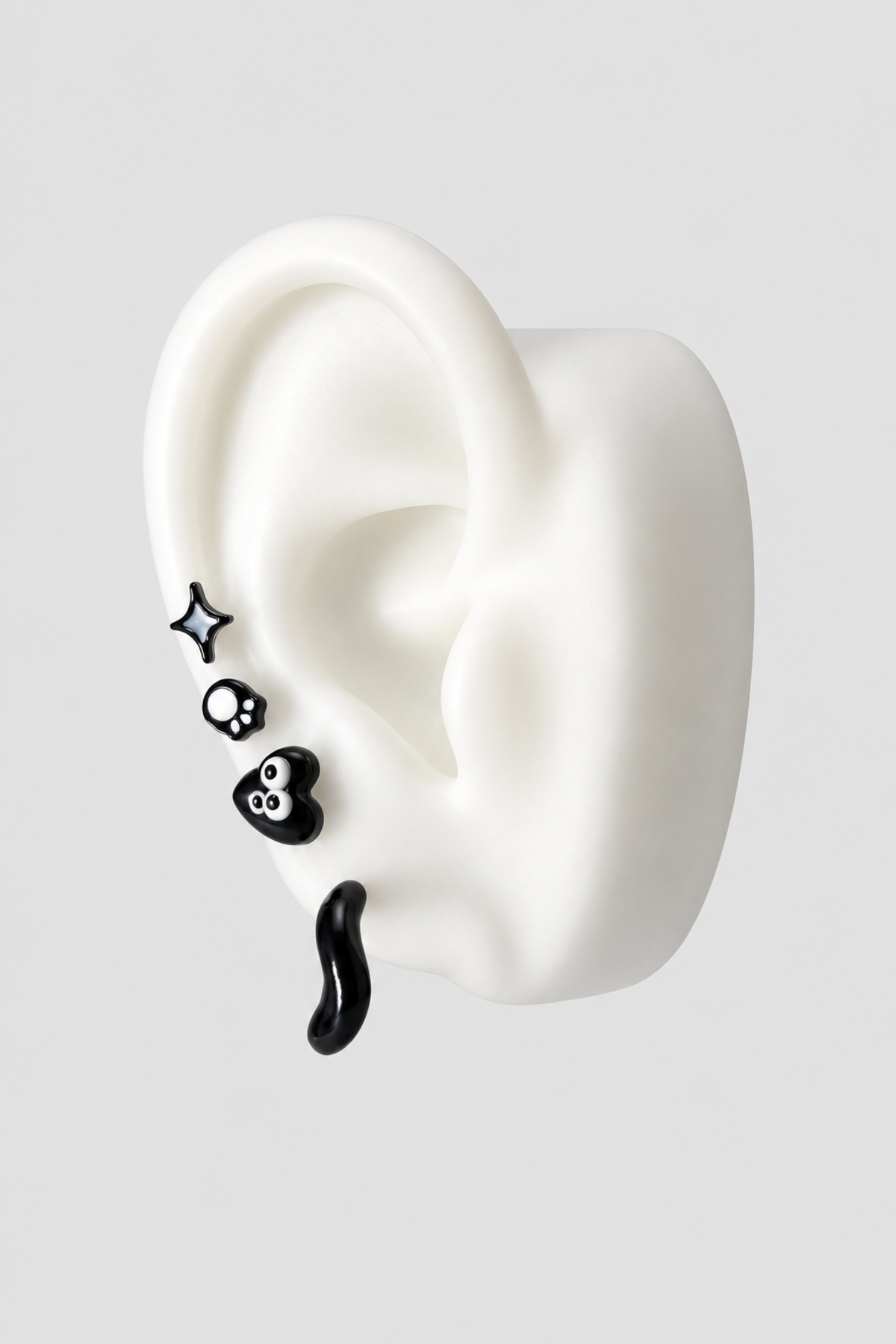 Lot de quatre pins noir et blanc
