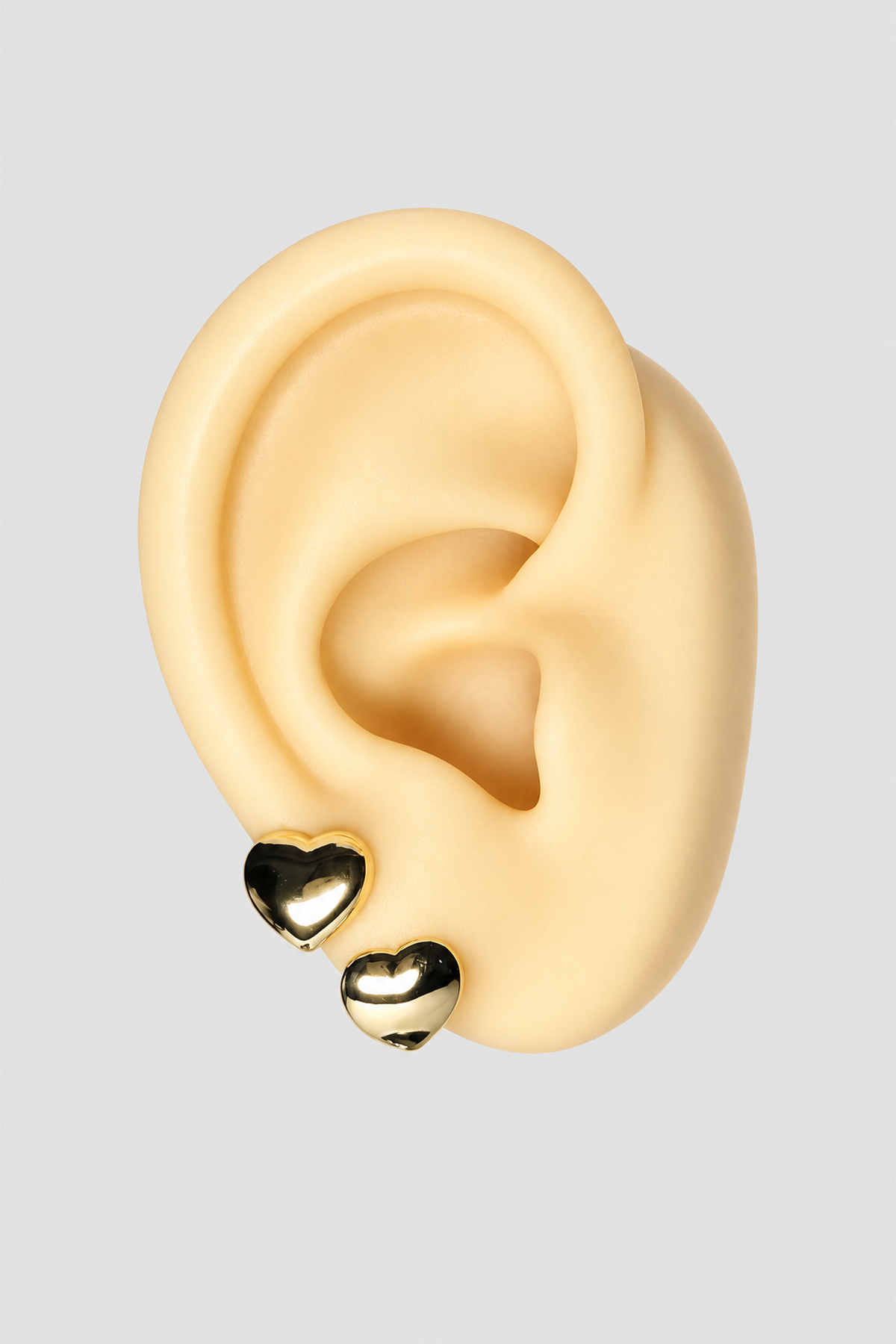 Boucles d’oreilles cœurs dorés en acier inoxydable