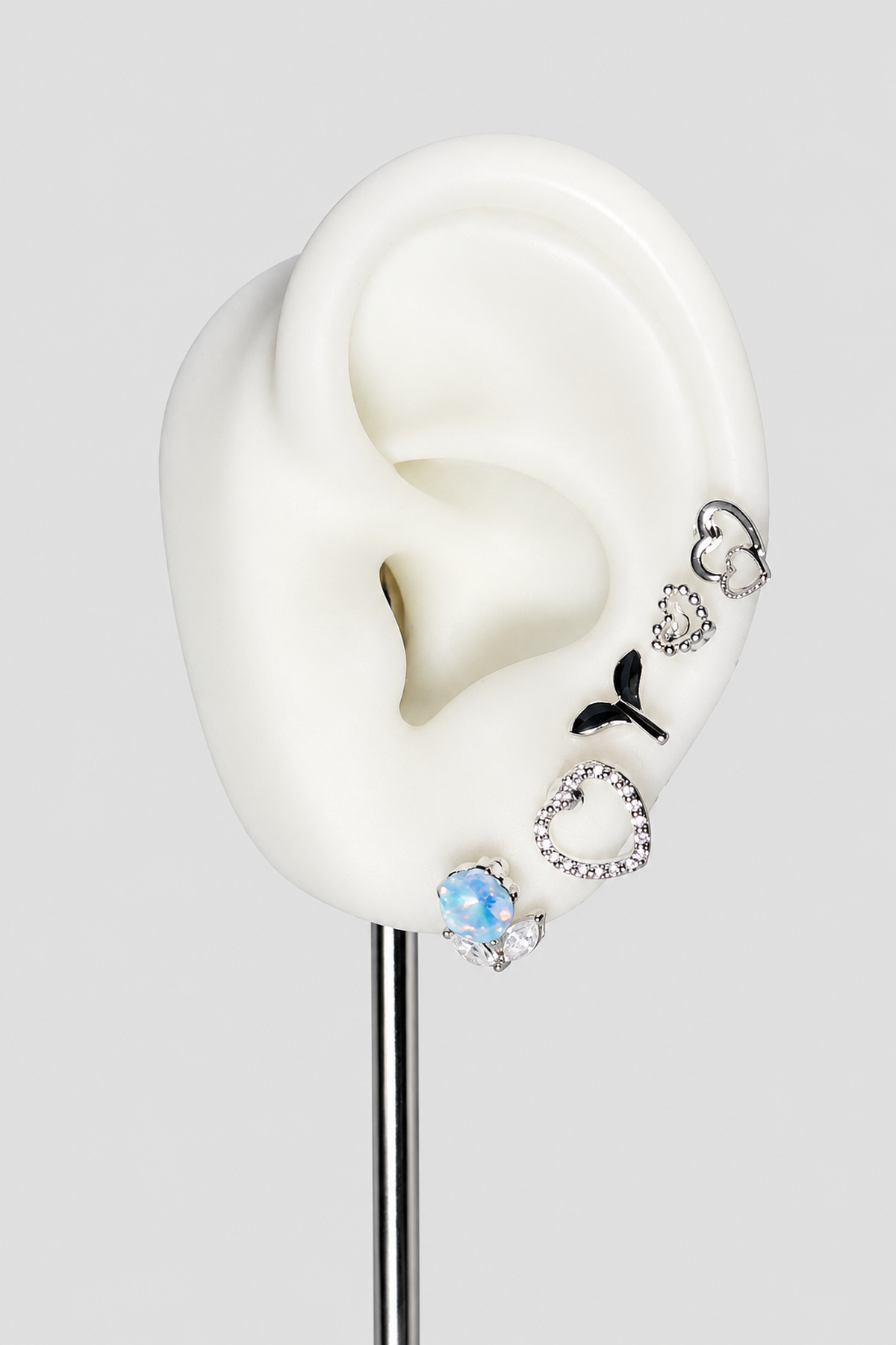 Lot de 5 bijoux d’oreille argentés à strass et cœur