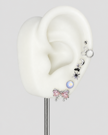 Lot de 7 bijoux d’oreille argentés à motifs variés