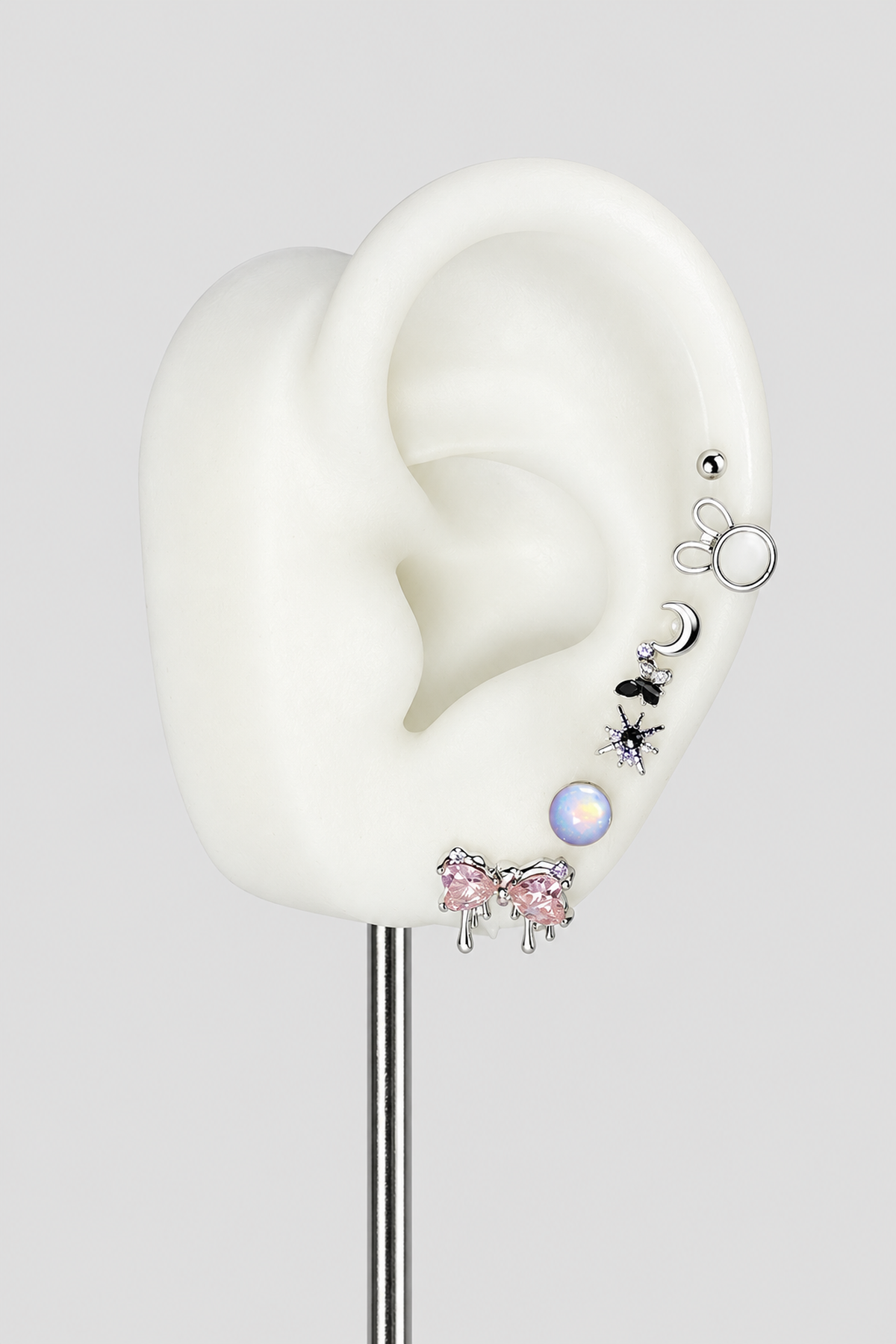 Lot de 7 bijoux d’oreille argentés à motifs variés