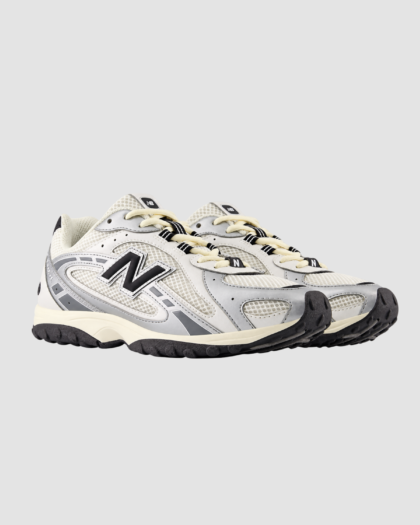 Paire de baskets New Balance U204LSWD argentées et noires pour garçon et fille